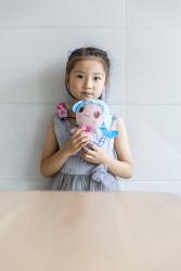 Enhui Dai wears a cochlear implant