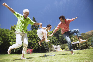 PH_Pic_Lifestyle_Audeo_Life_grandfather_father_son_sprinkler_HR.jpg
