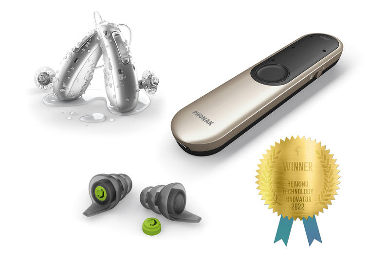 Phonak wins HTTM award with pictures of award-winning products and gold ribbon. 